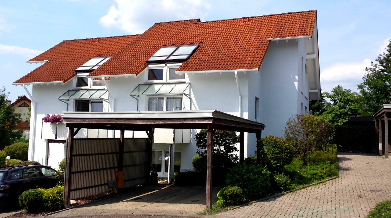 Mehrfamilienhaus in Rotenburg mit Carport und Dachgauben